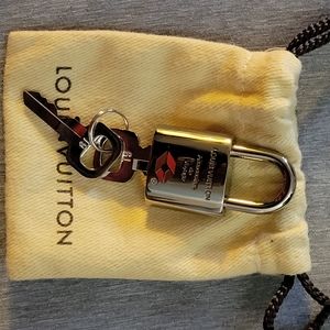 Louis vuitton TSA lock and keys silver